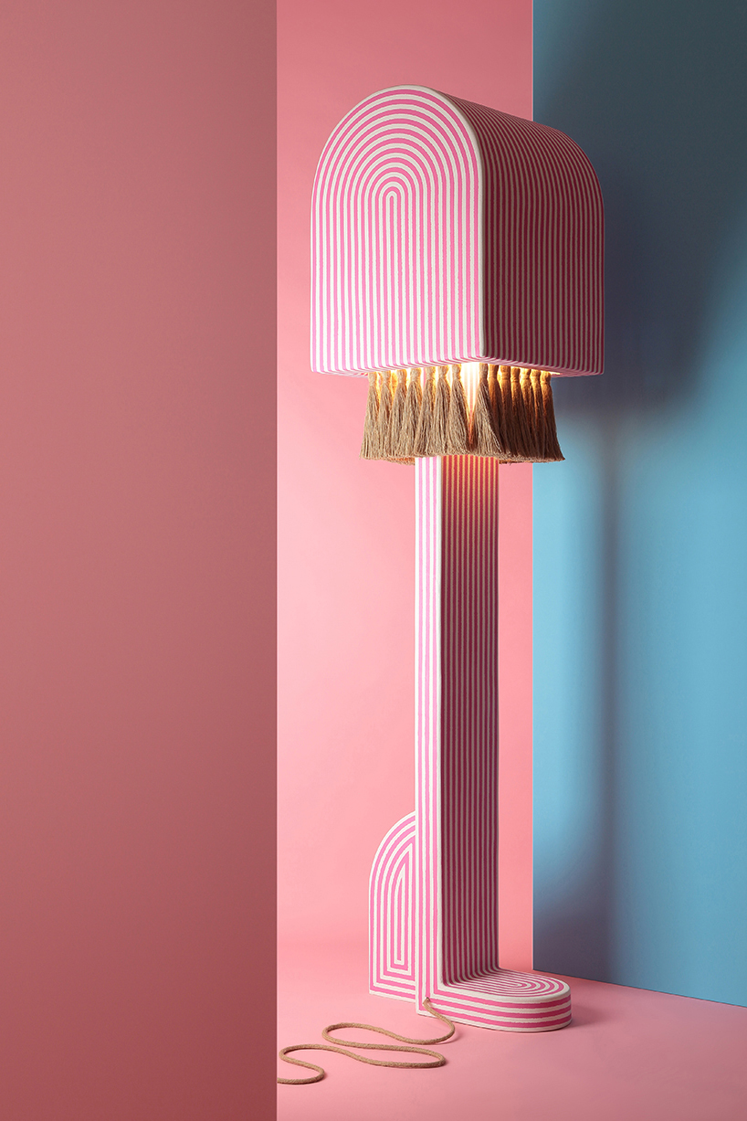 richard yasmine's lamps intertwine sleek architectural lines with organic jute textures