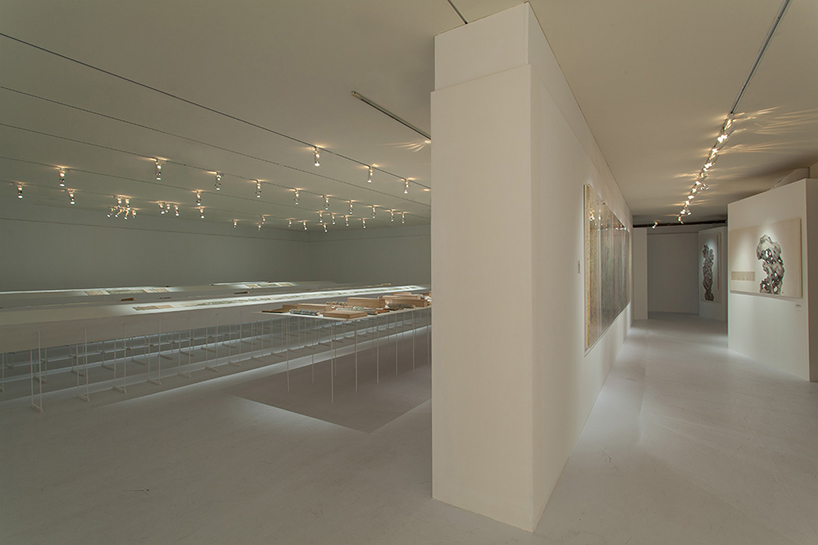 noiz architects designs minimal exhibition space for peng wei in taipei - 4