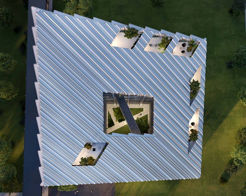 peter pichler maximizes north light with sloping roof for bonfiglioli HQ designboom