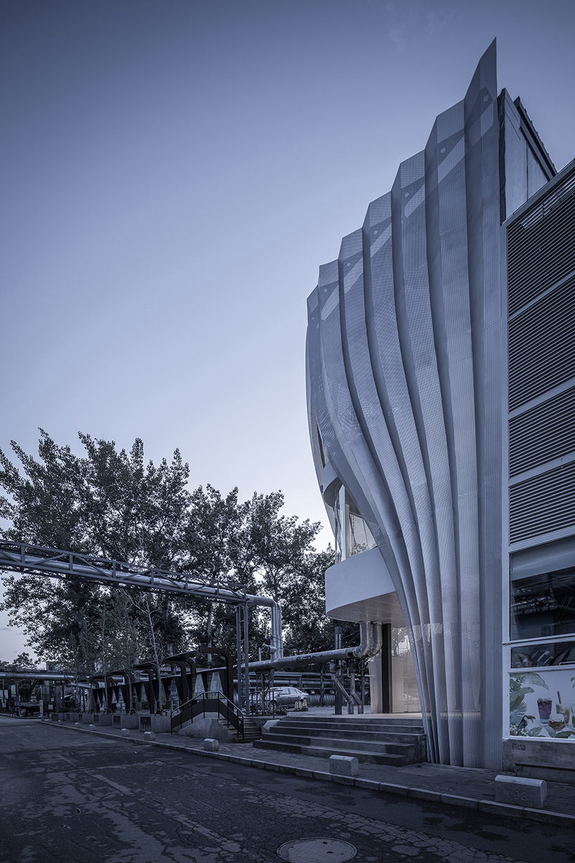 archstudio applies a translucent metal curtain to clad IOMA art center in beijing designboom