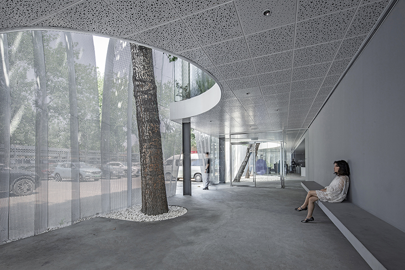 archstudio applies a translucent metal curtain to clad IOMA art center in beijing designboom