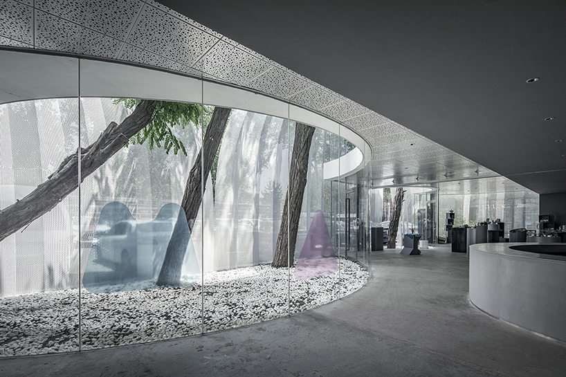archstudio applies a translucent metal curtain to clad IOMA art center in beijing designboom