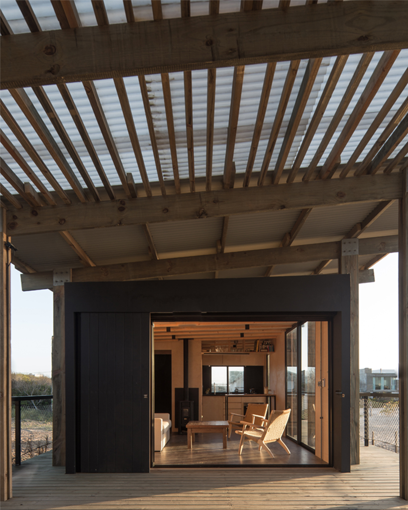 'punta rubia refuge' shielded by timber skeleton is settled along coastline in uruguay