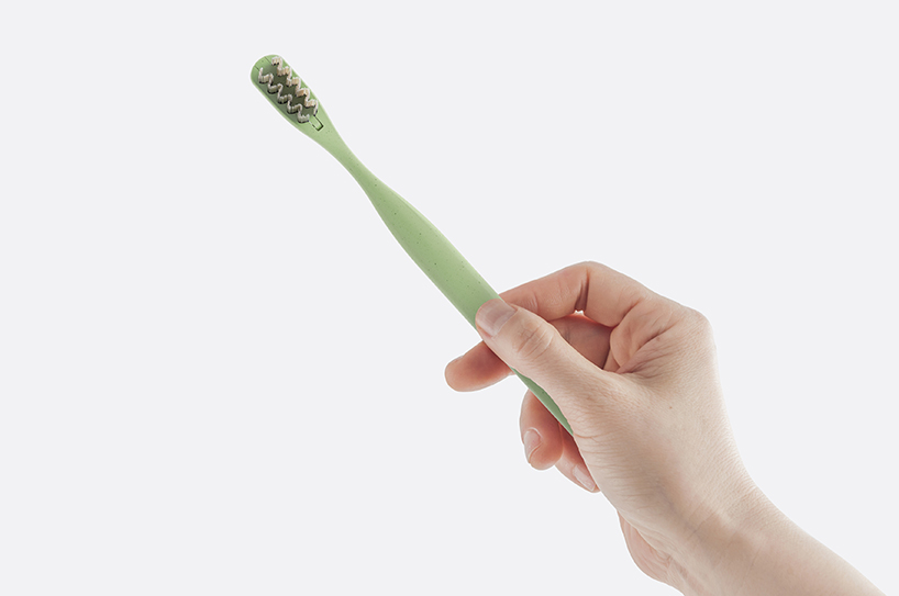 the everloop toothbrush is made with replaceable bamboo bristles and recycled plastic designboom