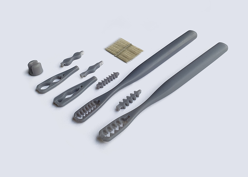 the everloop toothbrush is made with replaceable bamboo bristles and recycled plastic designboom