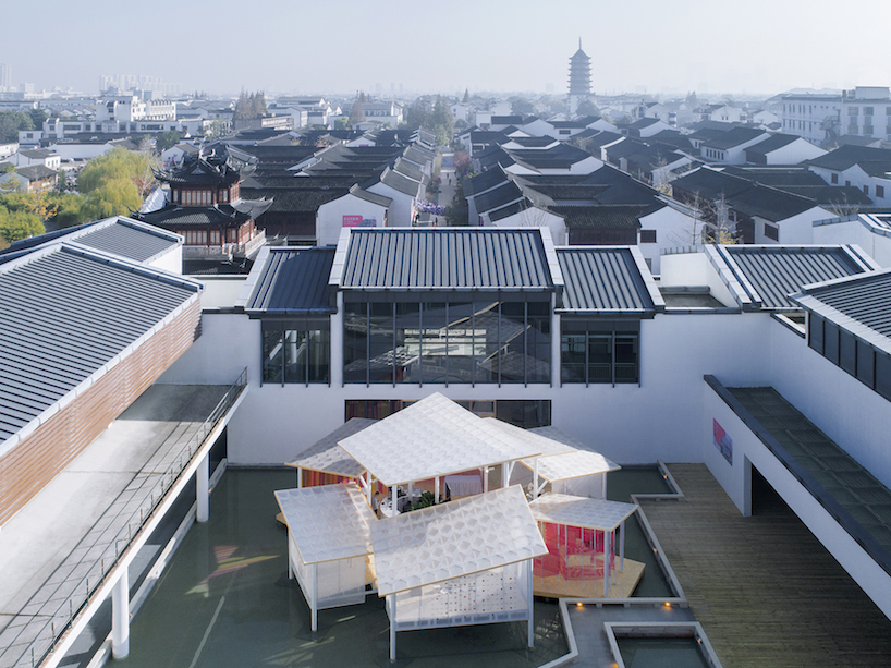MAT office creates a canopy of roofs for the 2018 suzhou design week pavilion 