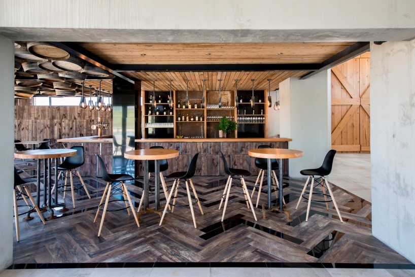 rustic meets chic in bar & event space by inhouse for anura vineyards - 1