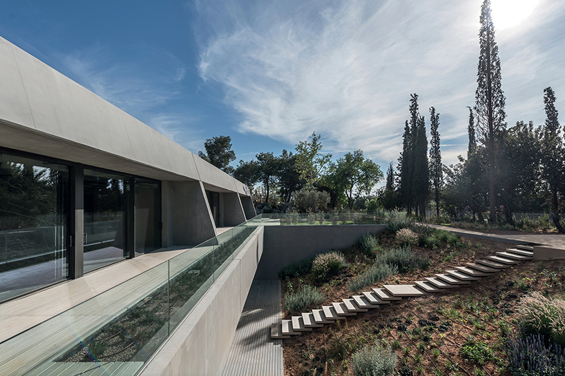 georges batzios architects revives building's original brutalist identity in greece