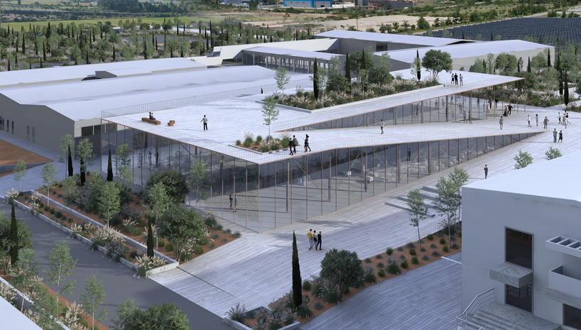 george batzios architects creates levels of interconnected planes with sloping facade