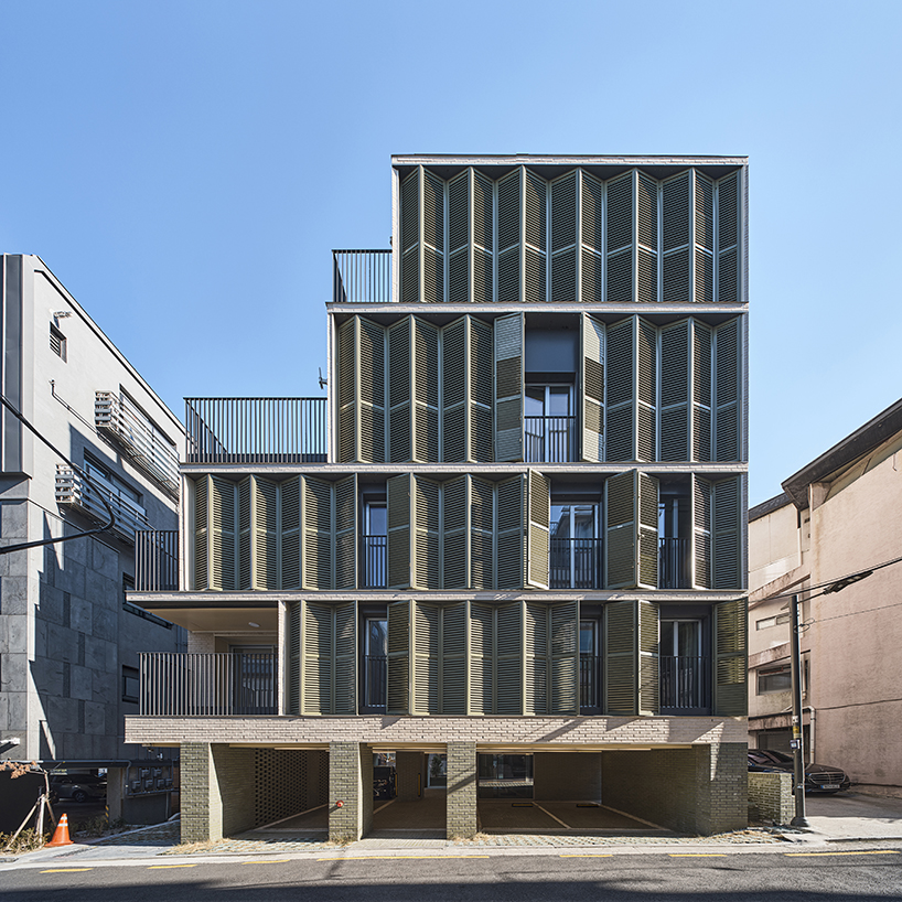 daniel valle architects' staggered villa stands out from restricted urban mass of seoul 