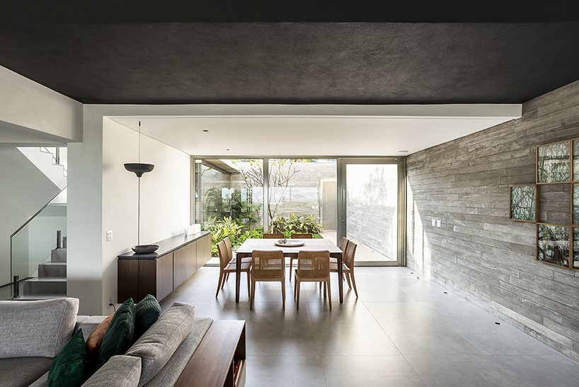 basiches arquitetos integrates outdoor spaces in the renovation of MF house in são paulo designboom