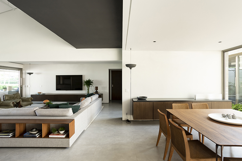 basiches arquitetos integrates outdoor spaces in the renovation of MF house in são paulo designboom