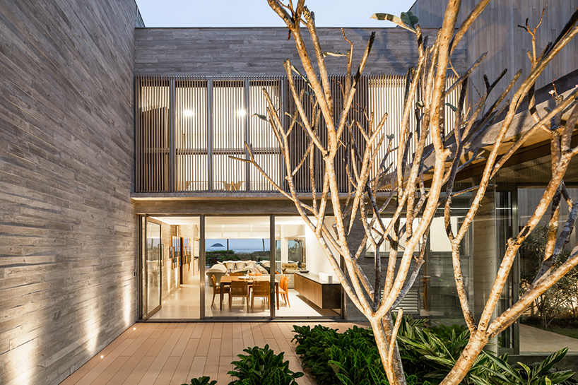 basiches arquitetos integrates outdoor spaces in the renovation of MF house in são paulo designboom