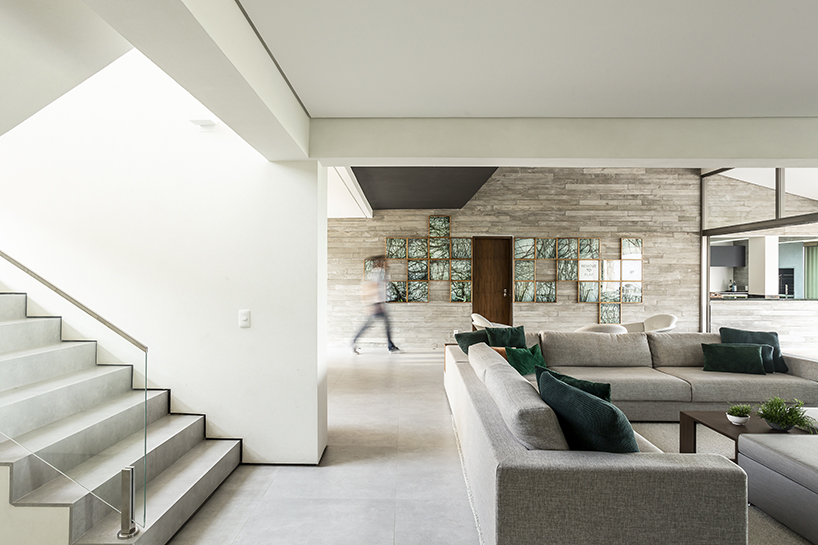 basiches arquitetos integrates outdoor spaces in the renovation of MF house in são paulo designboom