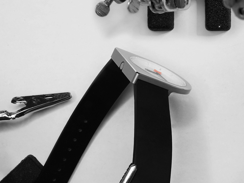 christo logan's good + evil omen watch carves a D-shaped face from a block of stainless steel 