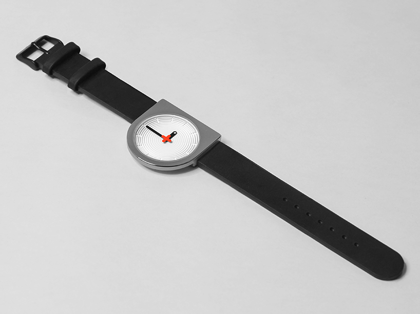 christo logan's good + evil omen watch carves a D-shaped face from a block of stainless steel 