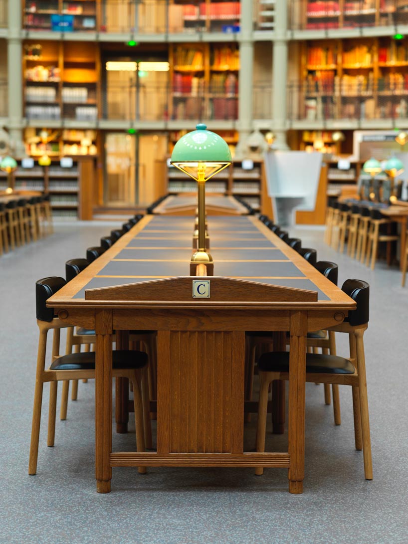patrick jouin and alki furnish national library of france with discreet wooden 'orria' chairs