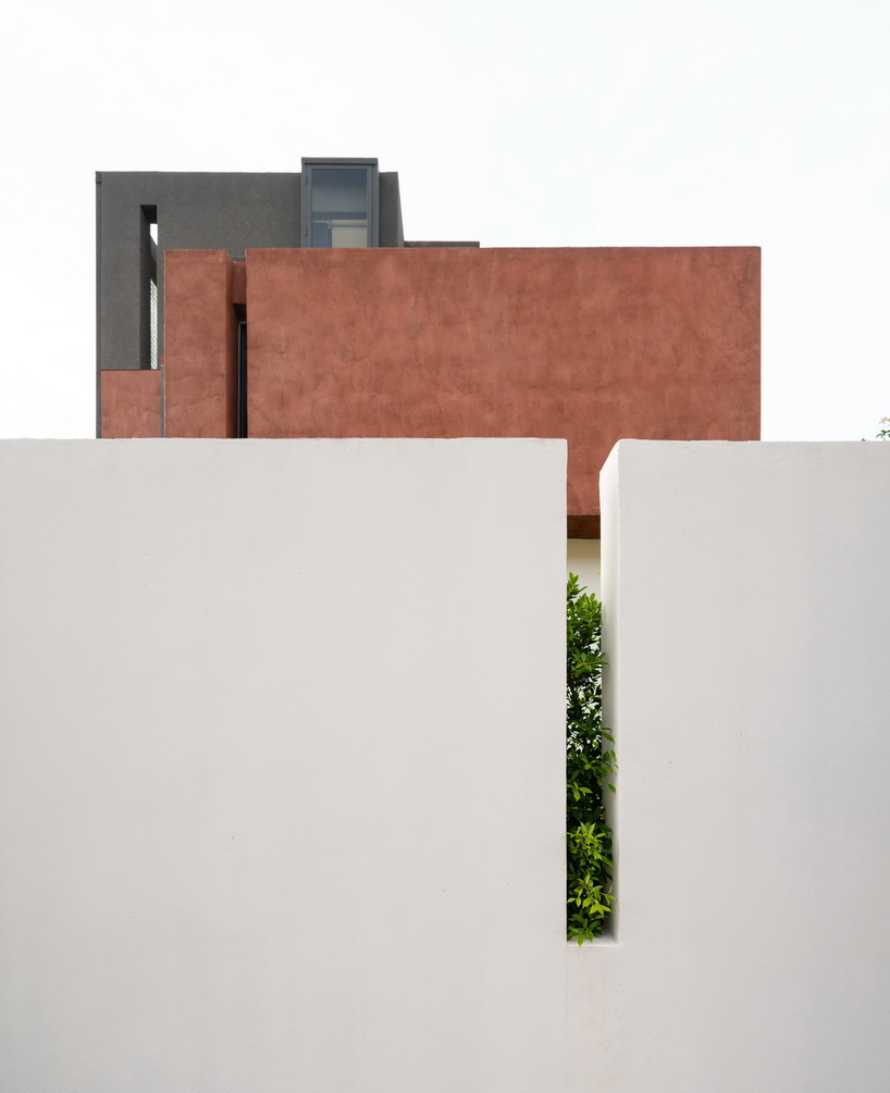 glass block walls bring natural light into archimontage's sena house in bangkok designboom