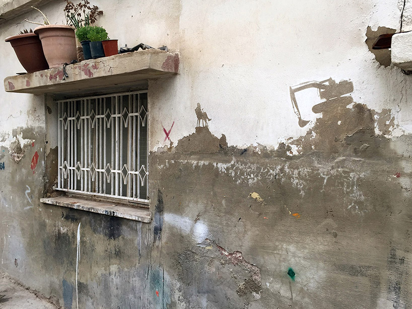 pejac wall peelings palestinian refugee camp jordan designboom