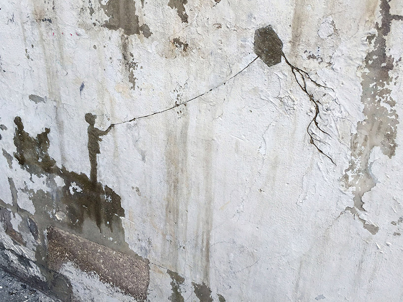pejac wall peelings palestinian refugee camp jordan designboom