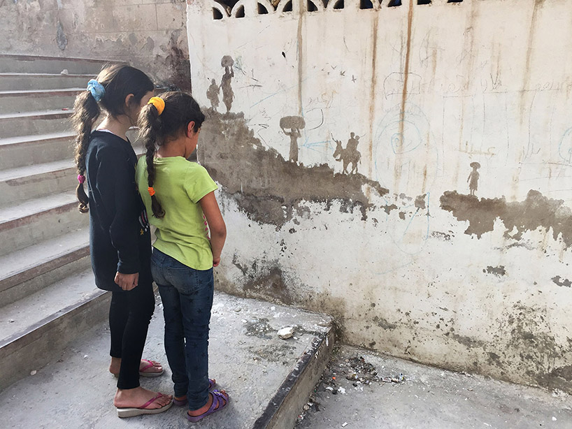 pejac wall peelings palestinian refugee camp jordan designboom