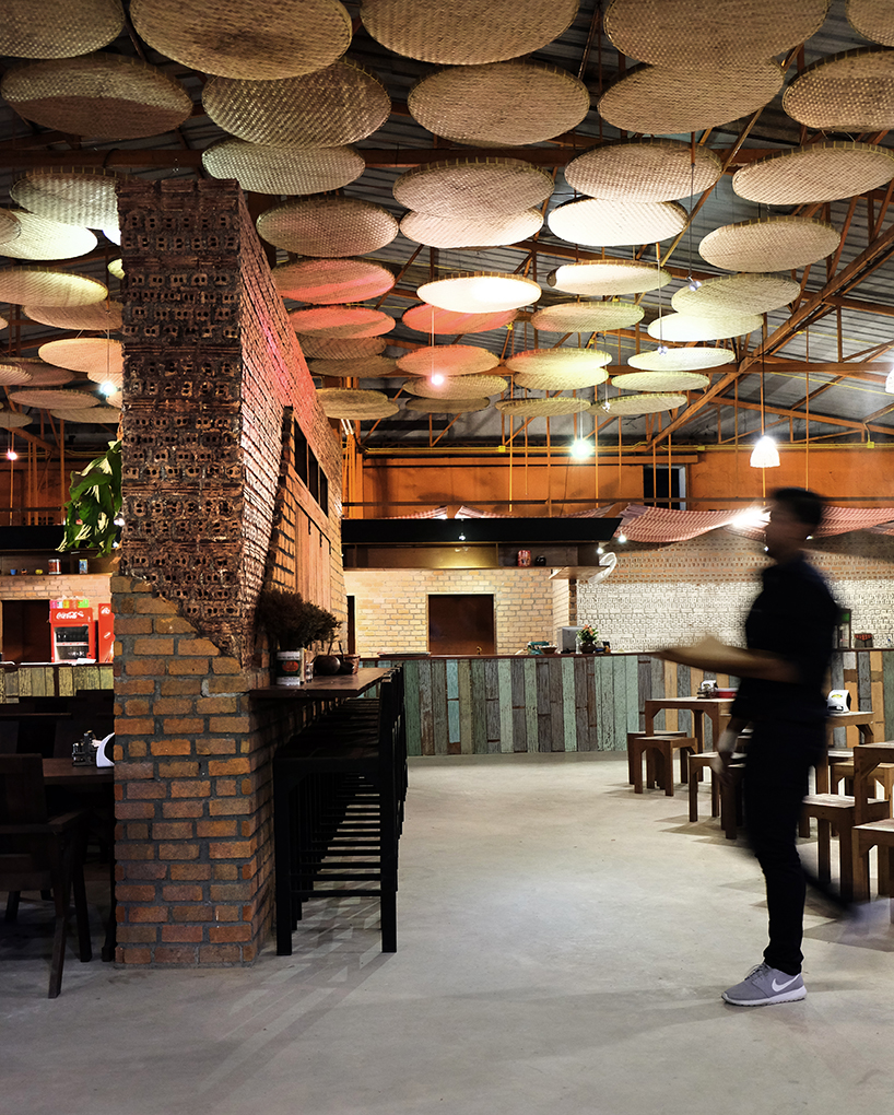 thaipan studio transforms warehouse into noodle restaurant in thailand thaipan studio 432 nai aek noodle restaurant thailand designboom
