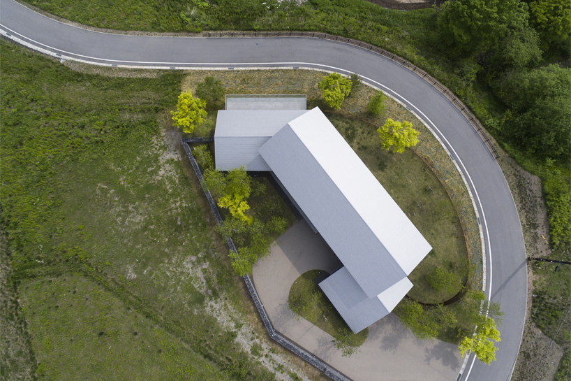 KIAS designs a cluster of concrete volumes for weekend house in japan designboom