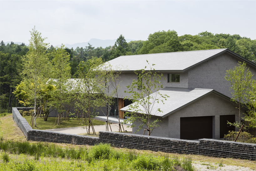 KIAS designs a cluster of concrete volumes for weekend house in japan designboom