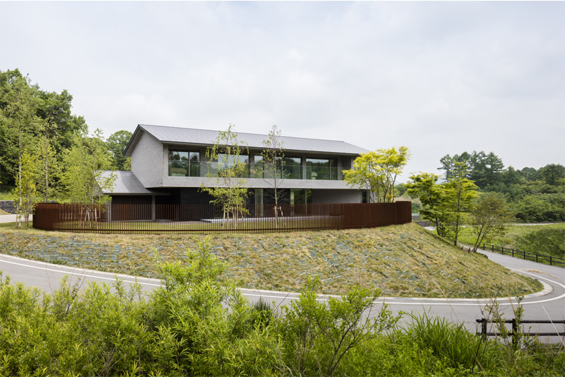 KIAS designs a cluster of concrete volumes for weekend house in japan designboom