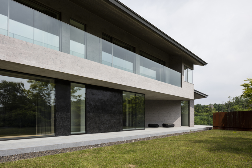 KIAS designs a cluster of concrete volumes for weekend house in japan designboom