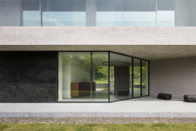 KIAS designs a cluster of concrete volumes for weekend house in japan designboom
