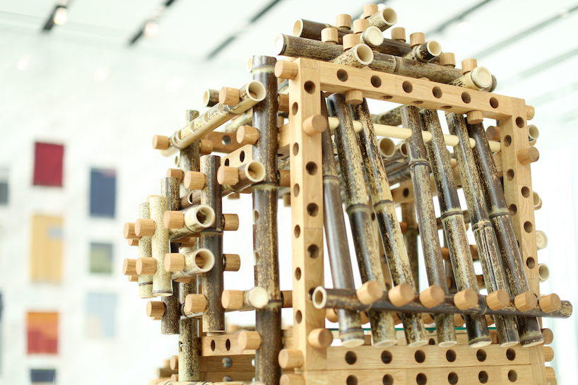shigeki yamamoto builds intricate cabinet from japanese bamboo and german oak designboom