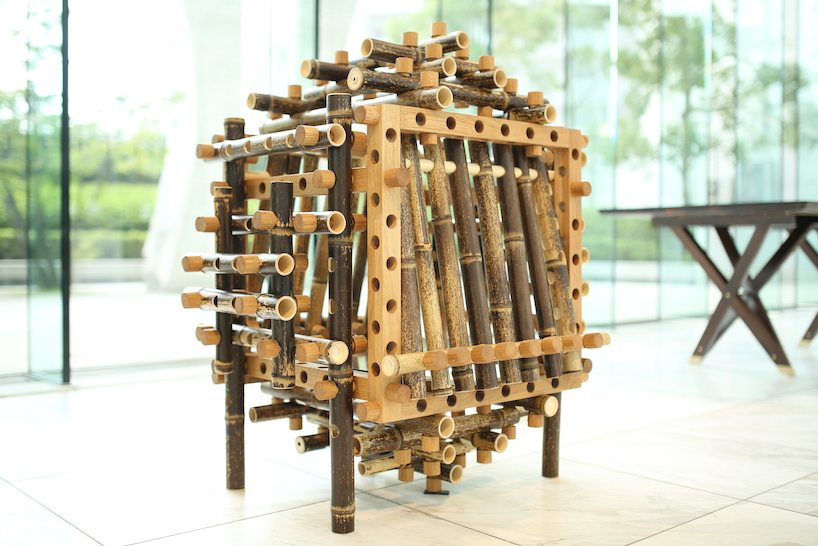 shigeki yamamoto builds intricate cabinet from japanese bamboo and german oak designboom