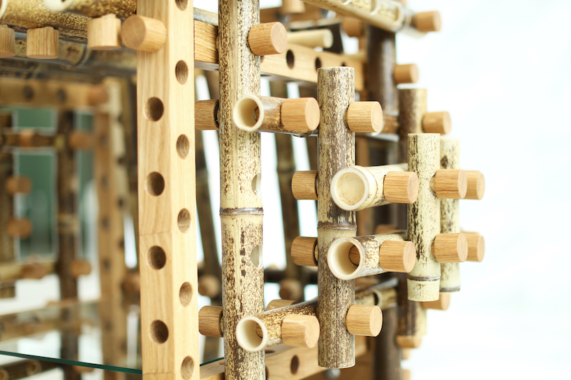 shigeki yamamoto builds intricate cabinet from japanese bamboo and german oak designboom