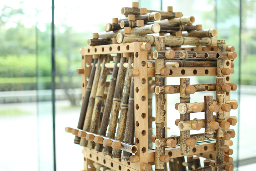 shigeki yamamoto builds intricate cabinet from japanese bamboo and german oak designboom