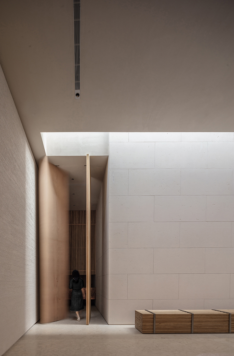 waterfrom design builds a tranquil teahouse around an old tree in china designboom