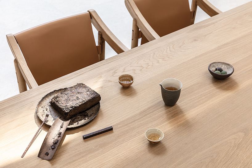 waterfrom design builds a tranquil teahouse around an old tree in china designboom