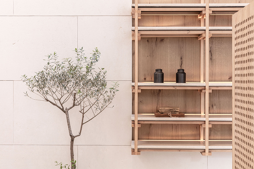 waterfrom design builds a tranquil teahouse around an old tree in china designboom