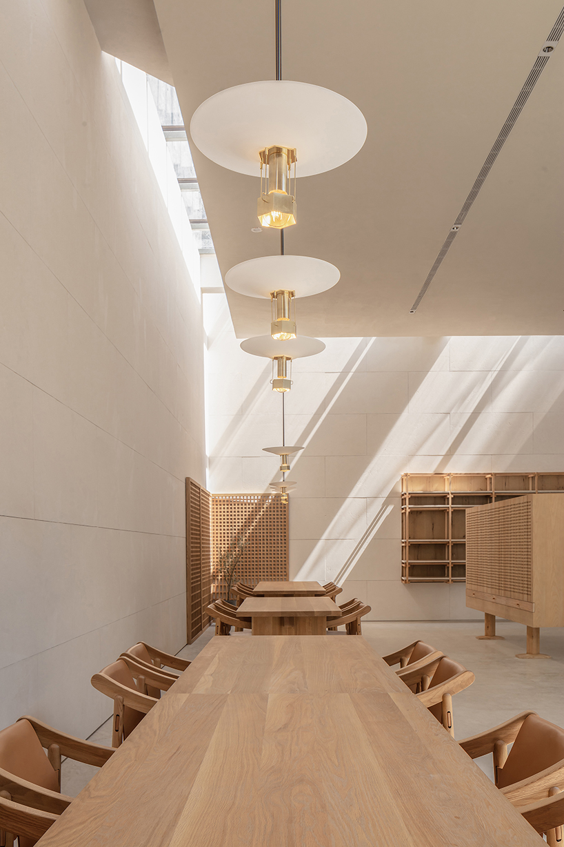 waterfrom design builds a tranquil teahouse around an old tree in china designboom