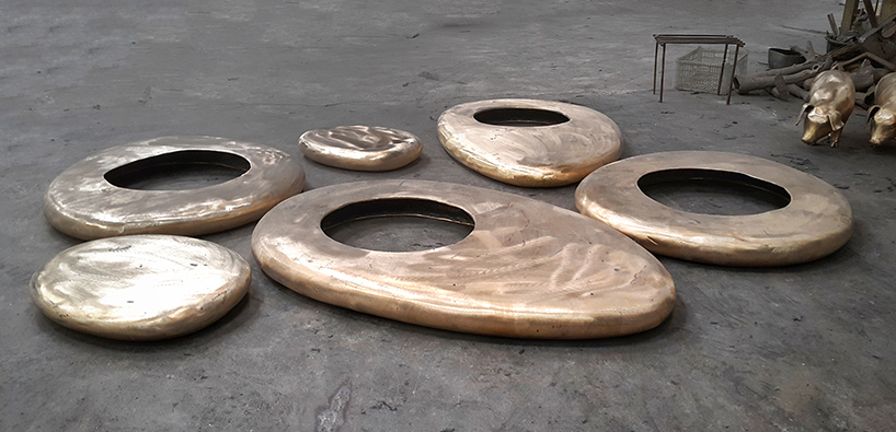 the 'zen stone' collection by chitapanya blends life and nature to create harmony