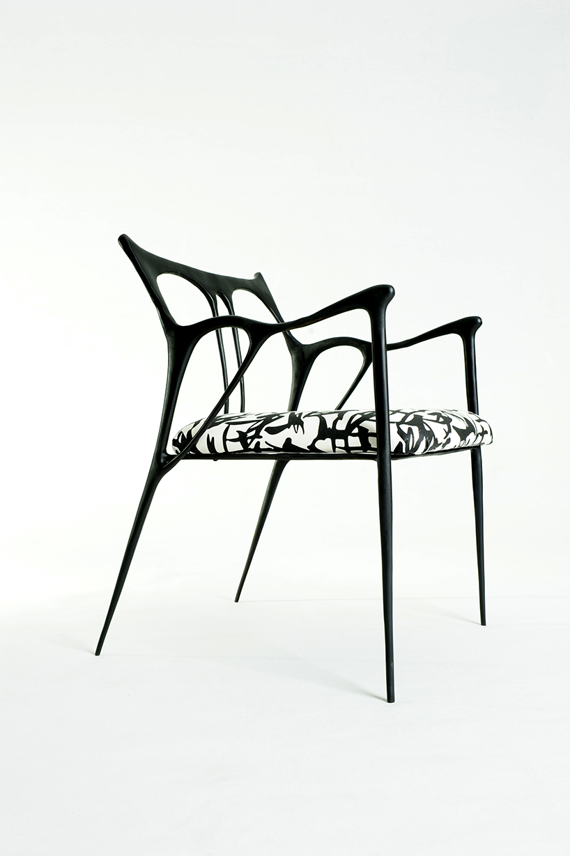 ink calligraphy furniture by apiwat chitapanya flows like chinese brushstrokes designboom