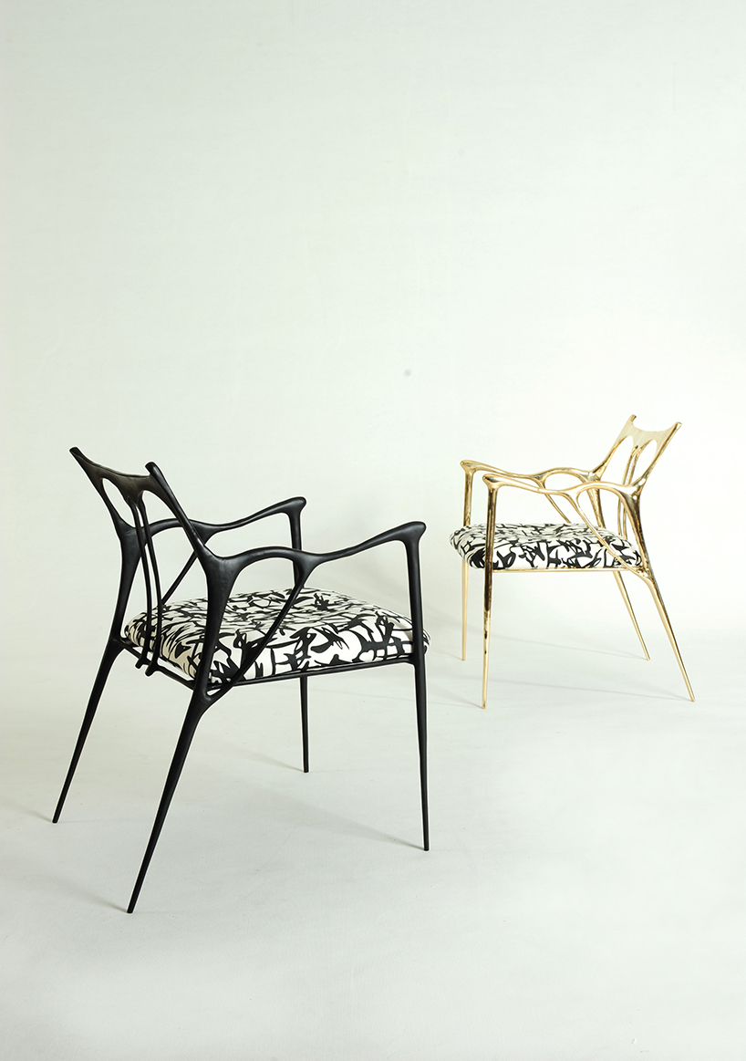 ink calligraphy furniture by apiwat chitapanya flows like chinese brushstrokes designboom