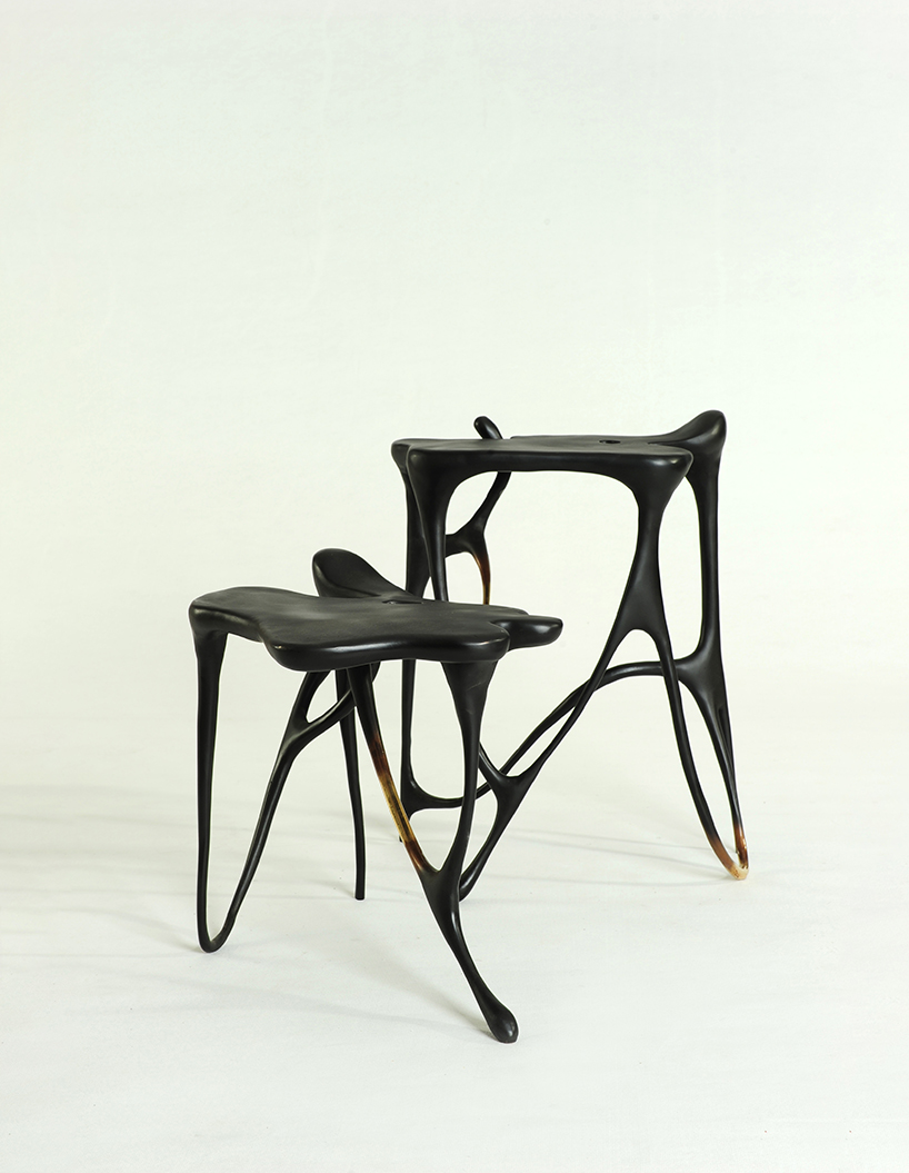 ink calligraphy furniture by apiwat chitapanya flows like chinese brushstrokes designboom