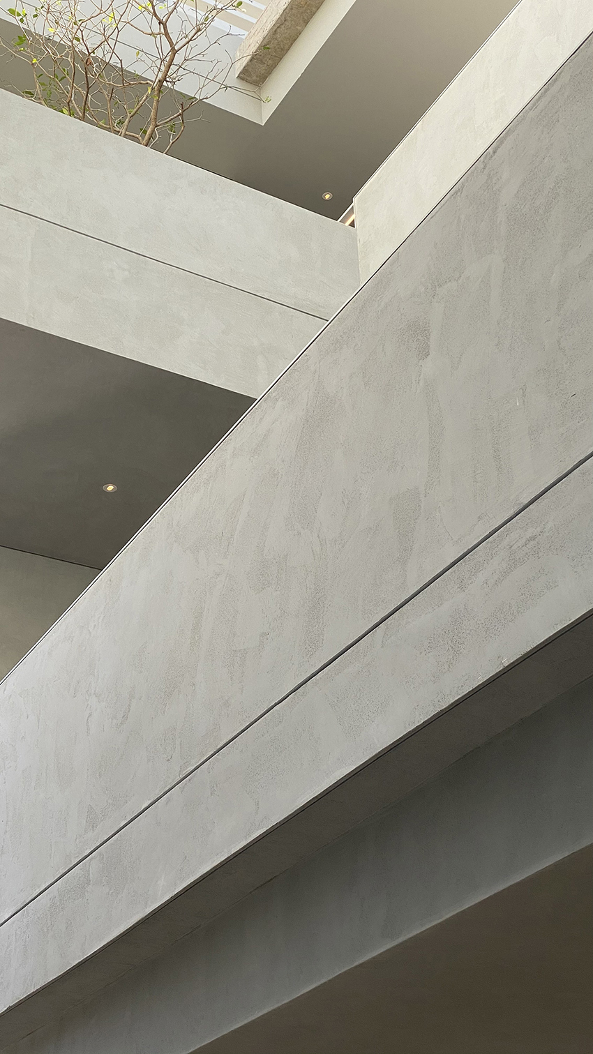 anonym studio creates house with brick façade and climbing wall in thailand