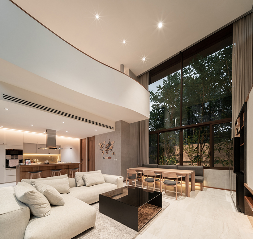 anonym studio stacks geometric rust and mortar volumes in tropical bangkok house