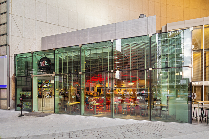 designphase dba adds glass façade to pizza restaurant in ...