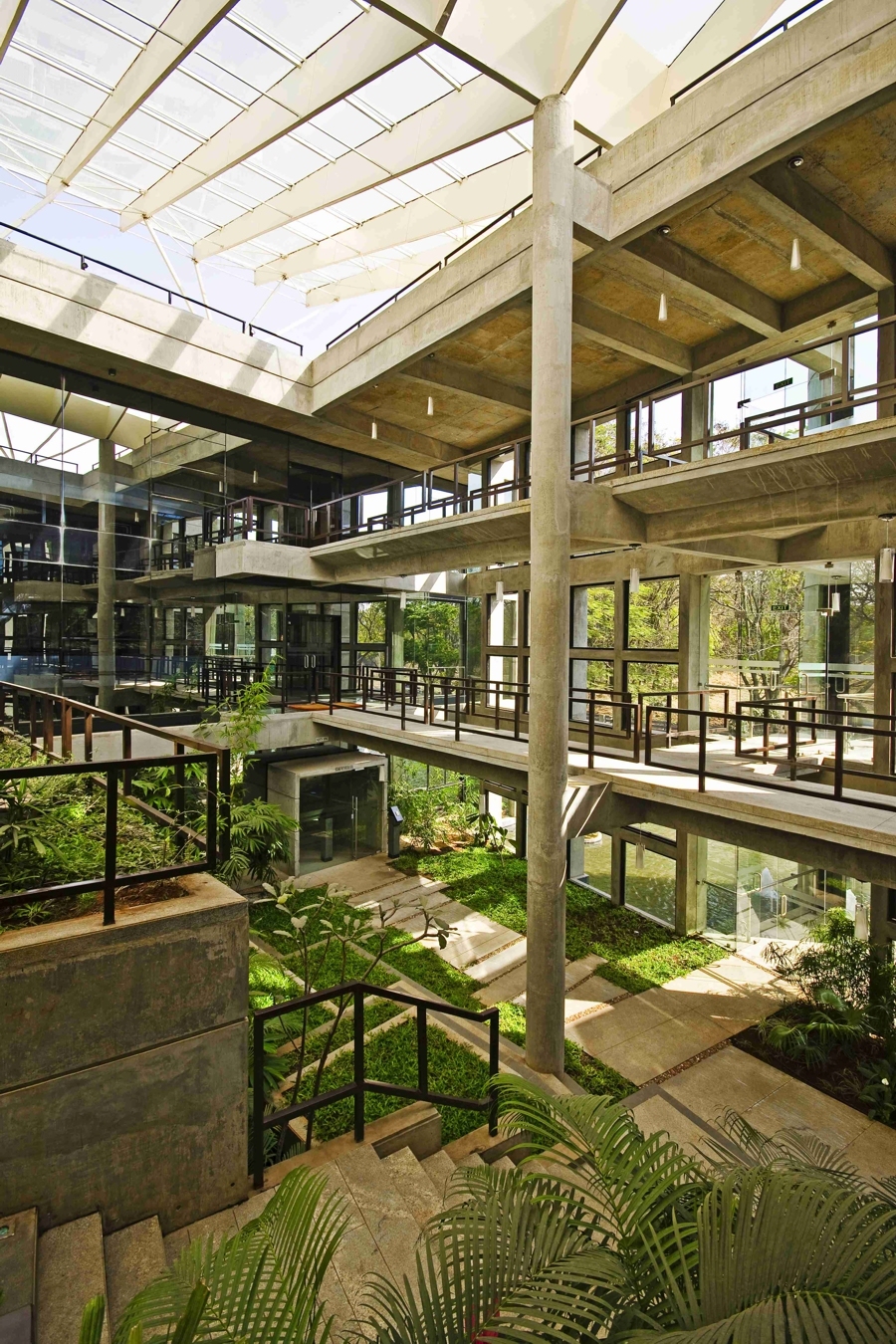 CORE architecture plants a tropical garden on a concrete hillock in this  energy-efficient office building, india