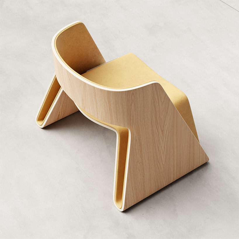 Teixeira Design Studio folds plywood like origami for void chair that stores books while seating users