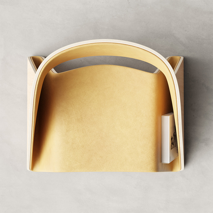 Teixeira Design Studio folds plywood like origami for void chair that stores books while seating users