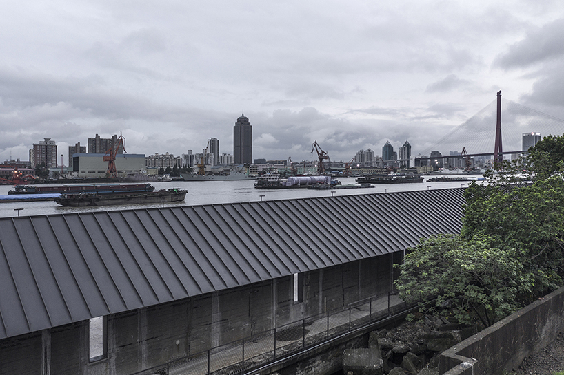 atelier deshaus transforms abandoned coal-unloading wharf into riverside passage in shanghai